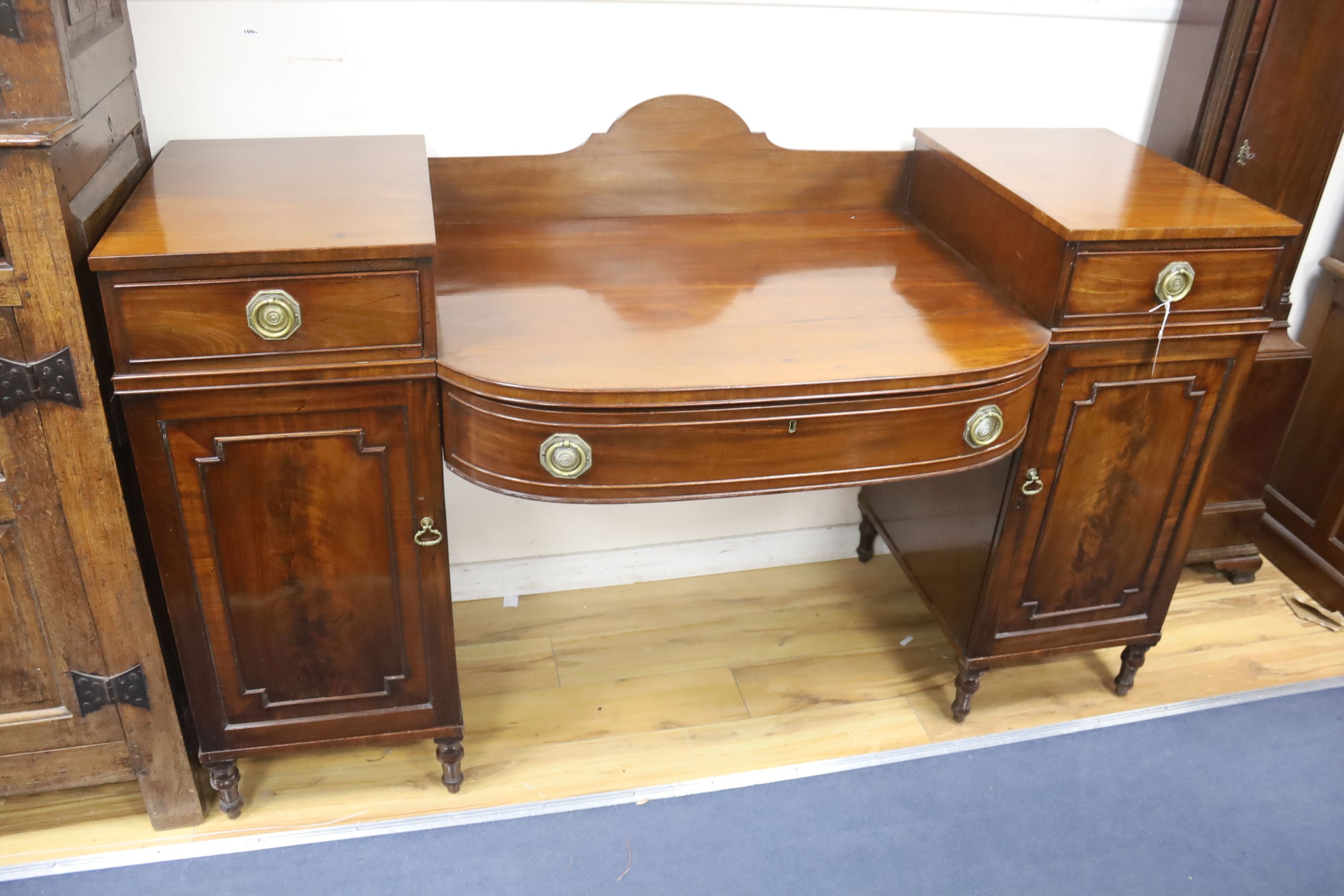 A Regency mahogany pedestal sideboard, length 184cm, depth 74cm, height 105cm